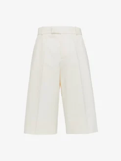 Shop Alexander McQueen Men's Pleated Baggy Shorts in Ivory