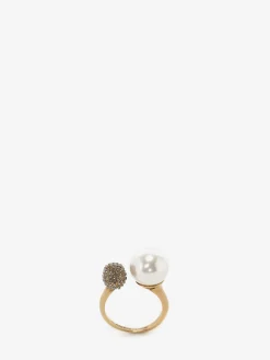Shop Alexander McQueen Women's Pearl-like Skull Ring in Antique Gold