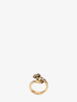 Store Alexander McQueen Women's Wrap-around Skull Ring in Gold